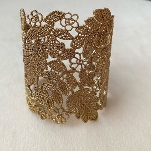 Open Lace bangle wide cuff bracelet. Stella and Dot design. Gold tone.
